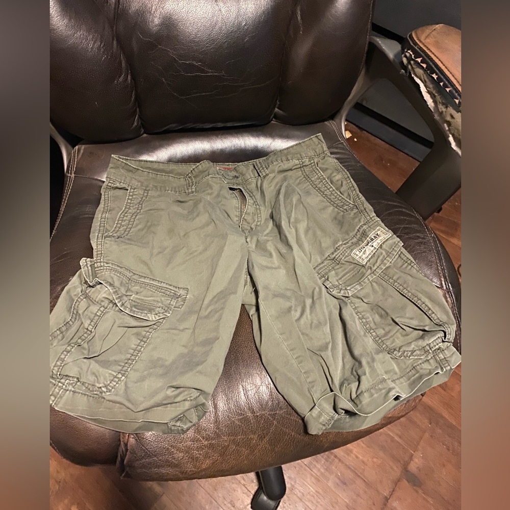 Cargo shorts, one pair is like a camo green and one pair is black